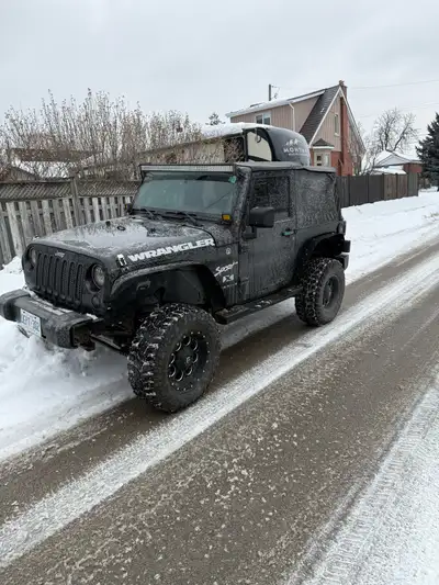 selling my jeep wrangler runs and drives 4x4 low and hi both work good it's a 6 speed manual . has 3...
