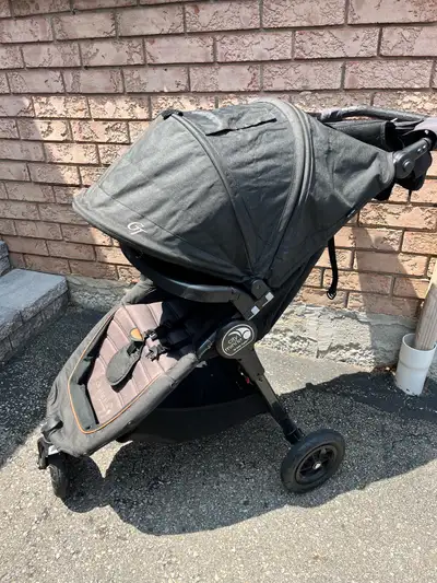 Great condition. Easy to maneuver. Includes the tray with cup holder, added handle bar cup holder/po...