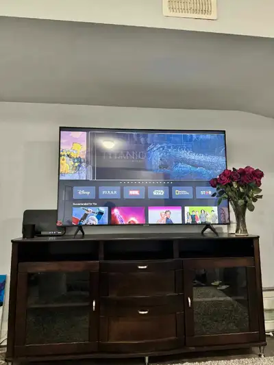 Samsung TV with TV stand, View more