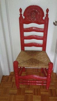 Unique wooden chair with rattan seat