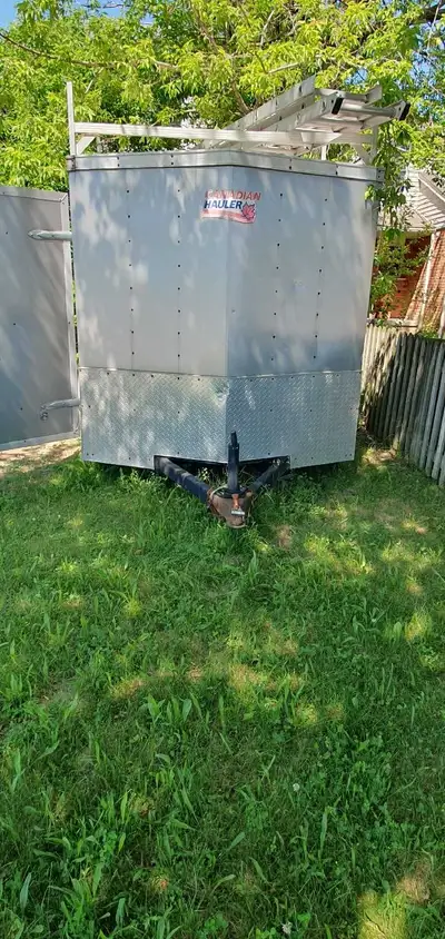Enclosed trailer for sale with or withouth roofing tools and supplies. H 6, L 10.5+ nose, W 6.5 . Ev...