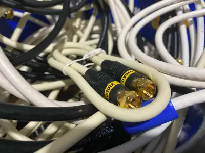 Box of assorted length of RCa video/TV cables. Price for whole box.