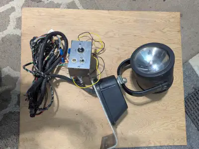 Remote controlled work light, rotates up and down, rotates right and left. Spot and flood light mode...