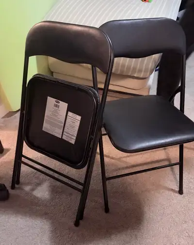 2 Black padded vinyl folding chairs NEW , View more