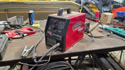 This is a used Lincoln Pro Core 100 welder, ready for your welding projects. It's a reliable machine...