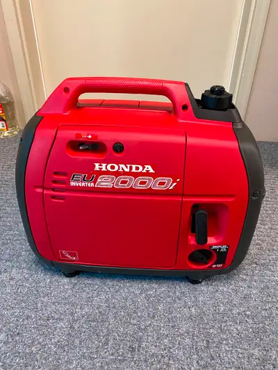 Honda generator 2000 for sale in mint cond. with very, very low hours. Used only few times to charge...