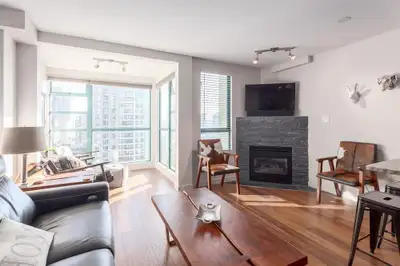 Enjoy easy city living in a clean, secure high-rise shared apartment. This private double-size bedro...