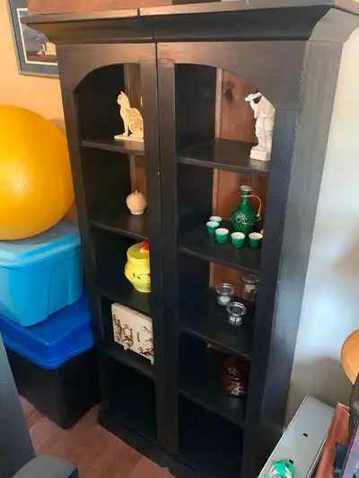 Beautiful SOLID 3 piece shelving. Middle piece stands over 7’ tall! Unable to show pics of it standi...