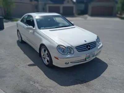 THIS or THAT? 2004 MERCEDES CLK 320 or 2015 CHEY IMPALA 2015 CHEY IMPALA $16900.00 with 140,000 KMS...