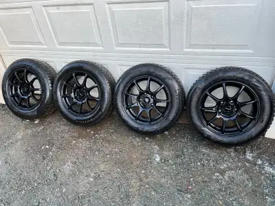 Set of fast aftermarket 15” alloys with directional winters 195/65/15 came off 15 civic. Still got s...