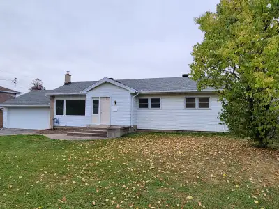 Lovely 3-bedroom Bungalow with Finished Basement. Location! Location! Lovey bungalow located on a la...