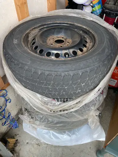 Used winter tires on steel rims, maybe 1 or 2 seasons left on them.