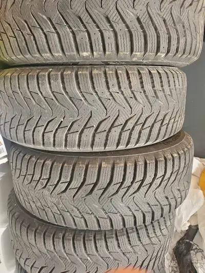 KUMHO winter tires 215 55 r17 98T Tires are on rims for a chev cruise diesel. The tires were on the...