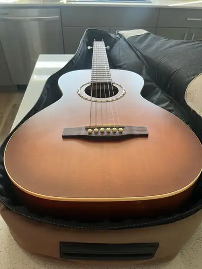 Like new,beautiful Art Lutherie six string guitar. Hardly used. Sounds great. Has proper soft case....