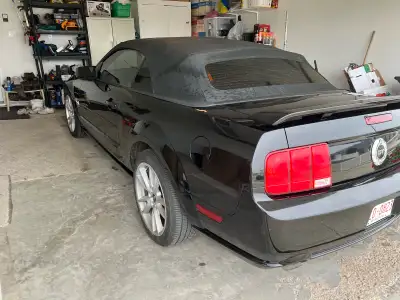 I am selling my used Ford Mustang convertible. It's a sleek black beauty with a powerful engine and...