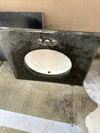 Bathroom granite counter top with sink