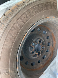 4 Firestone Winterforce tires with rims