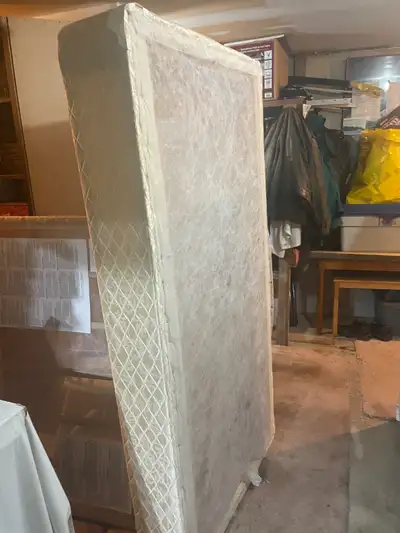 Free single bed box springs. Take 1 or take both. Good condition, View more