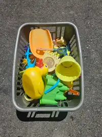 Big basket of assorted sand toys