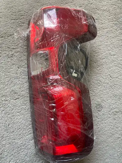 I’m selling Tail light fit Chevy Silverado 2019-2021 with bulb and hardware new in box right side pa...