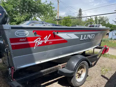 1992 Lund Pro V 1660 with 2013 75hp mercury outboard, 2001 9.9 kicker, updated seating, dual control...