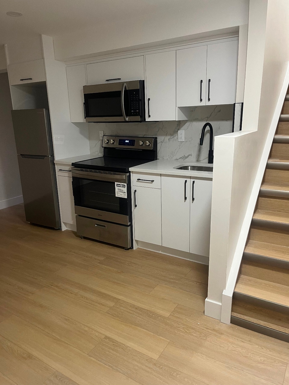 WALK OUT BASEMENT FOR RENT $1,200.00 CASTLERIDGE NE 1
