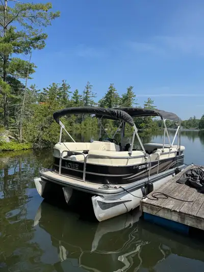 Well-maintained 2013 Lowe SS-210 Tritoon with a 115 HP Mercury four-stroke outboard motor. Full camp...