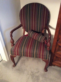 Lovely dark green and burgundy antique chair with cushion.