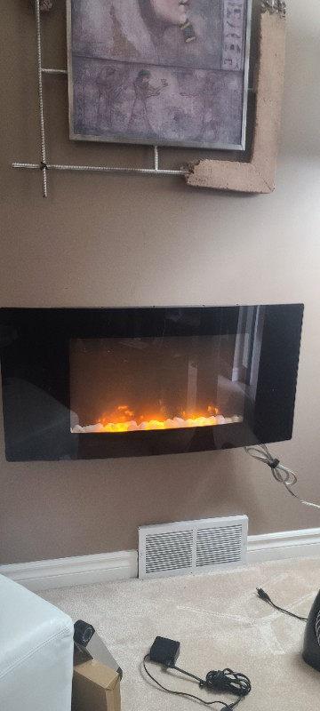 42" electric fireplace in Fireplace & Firewood in Calgary