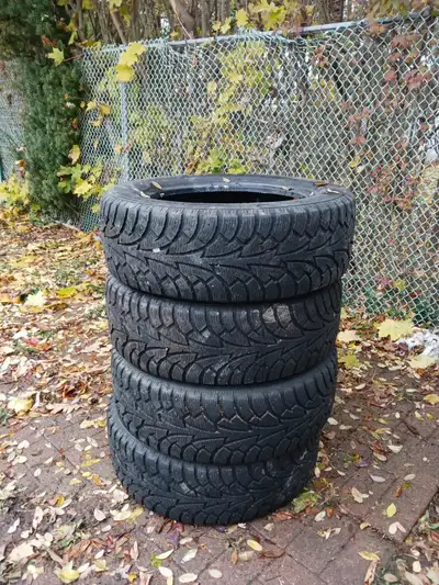 Hankook winter tires — set of 4 — 205/60R16 92T (fit many 16" vehicles) Condition: Excellent — appro...