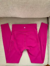 Pink lululemon leggings with pockets size 2