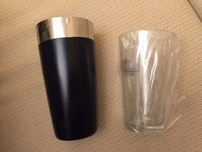 New in the box. Full size cocktail shaker comes in a pint tempered glass and stainless steel counter...