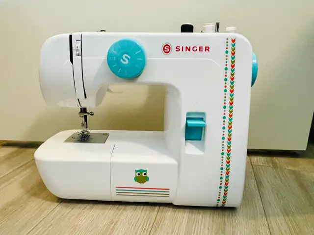 Singer 1234 Sewing Machine -  Includes 2 Lar438828583858350081