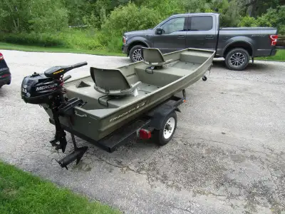 Tracker 1436 Jon Boat for sale, comes with 2023 3..5 Mercury 4 stroke motor, 55 LB Trolling Motor Mi...