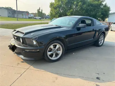 2008 ford mustang GT/CS, has a 4.6L V8 with a supercharger, makes 570HP. Has an after market exhaust
