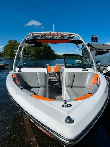 Ski Nautique's big 230. Low hours < 80. Wakeshaper. Fully Optioned. In water, located on Six Mile La...