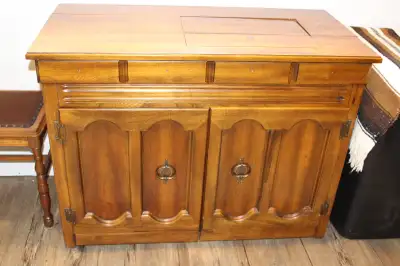 Free Singer Sewing Machine and cabinet., View more