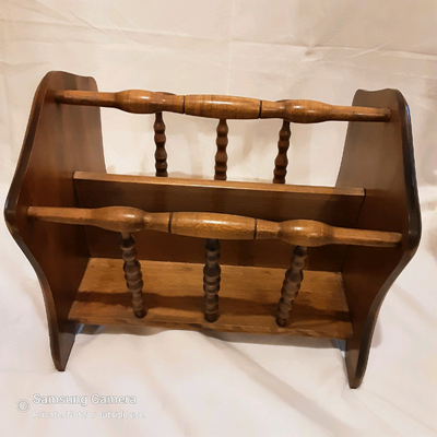 Beautiful turnings and beveled edges. Mid century, Rancher or Cabin. Good for many other uses; booze...