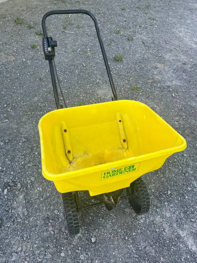 Walk behind spreader