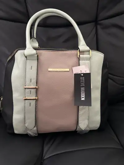 4 Betsey Johnson handbags in excellent condition 14” by 8” Shoulder strap 1 Steve Madden handbag Exc...