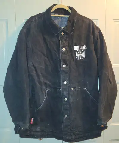 West coast choppers Jesse James black denim coat. Blanket lined. Some fade. No significant wear anyw...