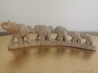 Row of 5  Elephants