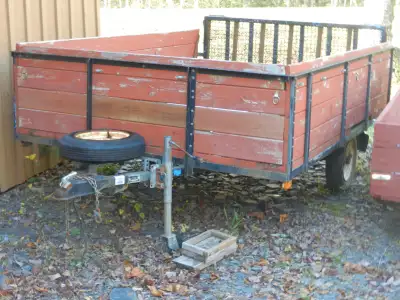 Large utility trailer will accommodate side by side or ATV. Large folding rear ramp. 2" ball. Asking...