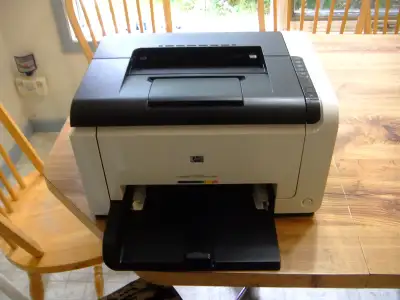 The model is an HP CP1025nw. It works fine, but is a slow-printing model. It has plenty of black ton...