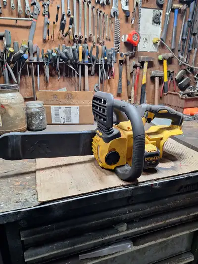 Dewalt 20v chainsaw - complete - not working. (tool only) $55. Metcalfe
