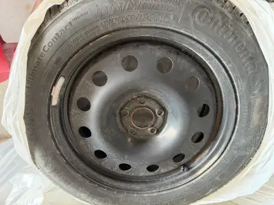 Selling a complete set of 4 Continental VikingContact 7 winter tires mounted on steel rims with TPMS...