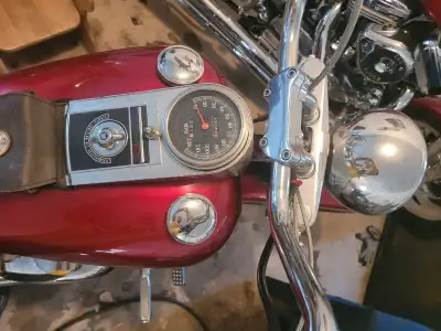 Harley Davidson fat boy 1986. 30000kms . Fully customized crome and candy apple red