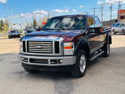 2010 Ford Super Duty F-350 SRW 4WD Crew Cab 156" XL which comes with Sunroof, 2 set of keys, Heated...