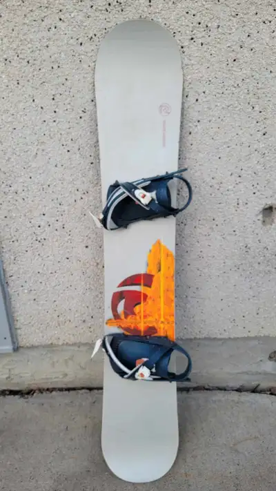 Rossignol Imperial Snowboard Comes with dukes bindings (have wear) Flames & Logo Pattern The board i...