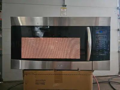 Samsung Over the Range Microwave with Vent Fan  Model: SMH9187ST, View more